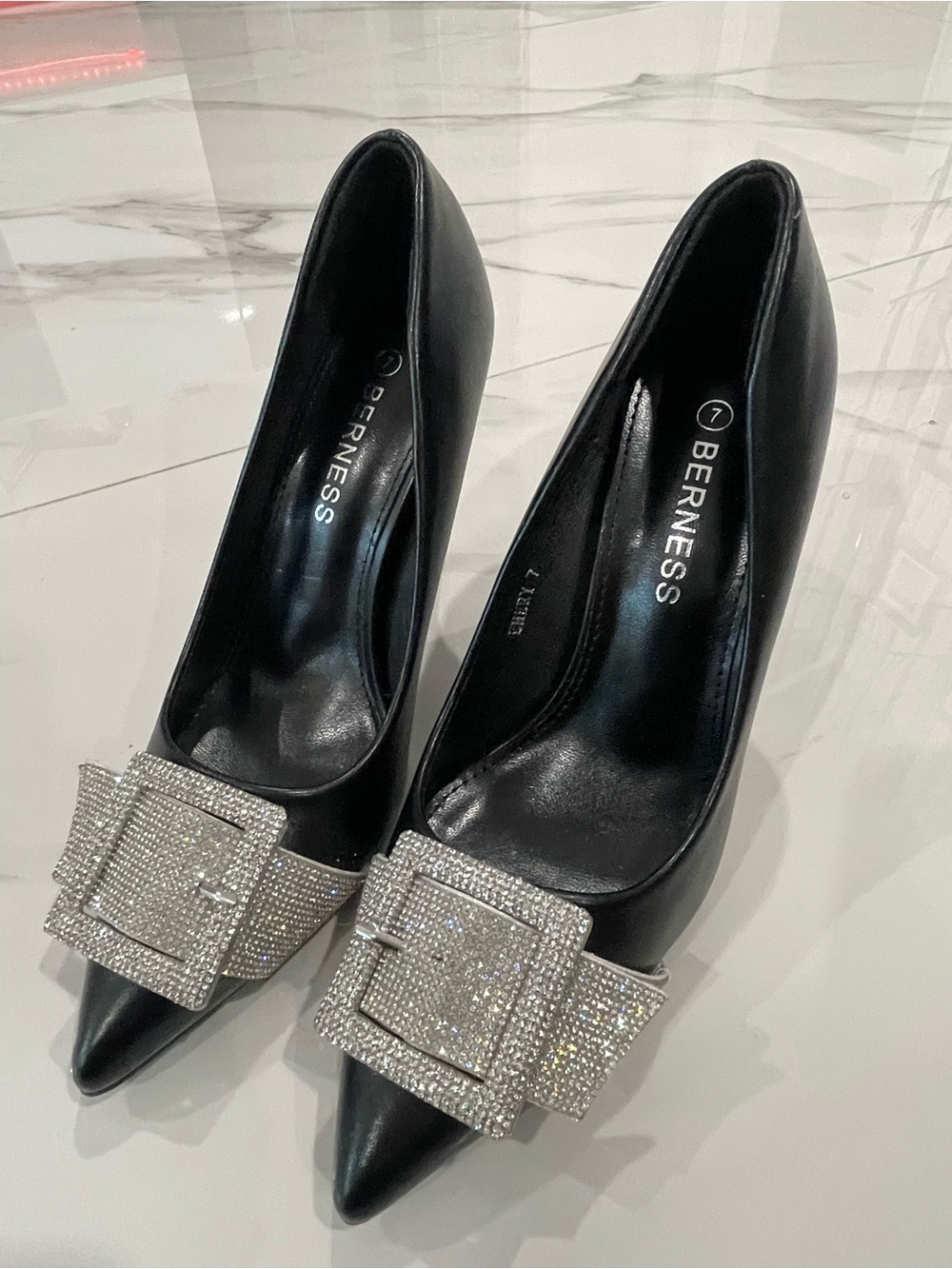 Berness Black Pointed Toe Pumps with Crystal Buckle Accent